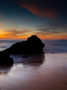 Preview wallpaper rocks, coast, sea, evening, dark