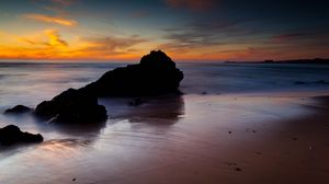 Preview wallpaper rocks, coast, sea, evening, dark