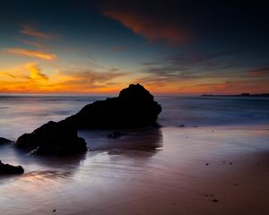 Preview wallpaper rocks, coast, sea, evening, dark