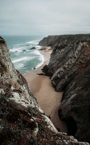 Preview wallpaper rocks, coast, sea, surf, sand