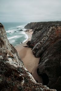 Preview wallpaper rocks, coast, sea, surf, sand