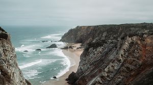 Preview wallpaper rocks, coast, sea, surf, sand