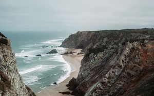 Preview wallpaper rocks, coast, sea, surf, sand