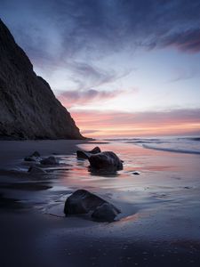 Preview wallpaper rocks, coast, sea, stones, water, sunset