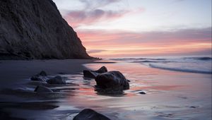 Preview wallpaper rocks, coast, sea, stones, water, sunset