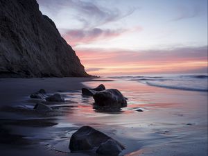 Preview wallpaper rocks, coast, sea, stones, water, sunset