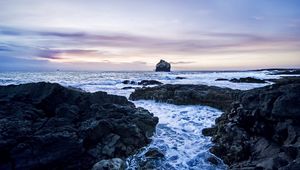 Preview wallpaper rocks, coast, sea, evening, cold, foam, gloomy