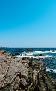 Preview wallpaper rocks, coast, stones, sea, waves, wavy