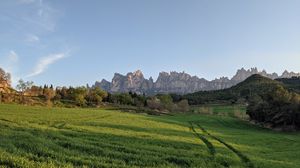 Preview wallpaper rocks, field, grass, trees, landscape