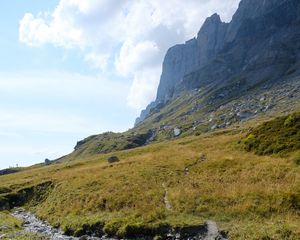 Preview wallpaper rocks, hill, grass, path, stones, nature