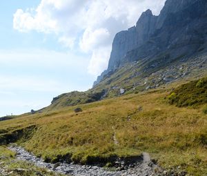 Preview wallpaper rocks, hill, grass, path, stones, nature