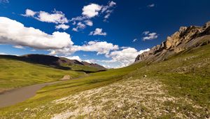 Preview wallpaper rocks, hills, field, clouds, landscape