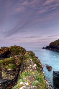 Preview wallpaper rocks, moss, cloudy, landscape, sea, grief