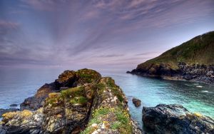 Preview wallpaper rocks, moss, cloudy, landscape, sea, grief