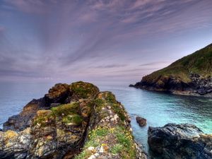 Preview wallpaper rocks, moss, cloudy, landscape, sea, grief