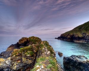 Preview wallpaper rocks, moss, cloudy, landscape, sea, grief