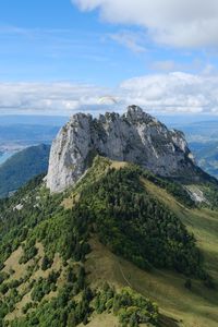 Preview wallpaper rocks, mountain, slope, trees, paraglider