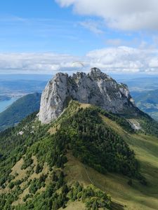 Preview wallpaper rocks, mountain, slope, trees, paraglider