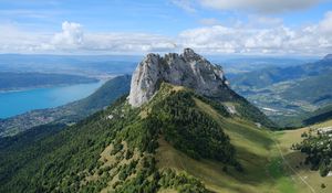 Preview wallpaper rocks, mountain, slope, trees, paraglider