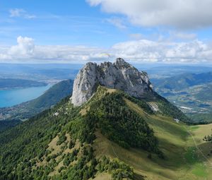 Preview wallpaper rocks, mountain, slope, trees, paraglider