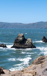 Preview wallpaper rocks, mountains, beach, sea, ocean, nature