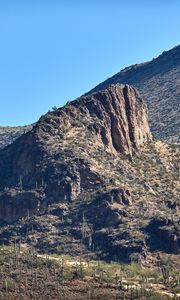 Preview wallpaper rocks, mountains, cactus, slope, sky