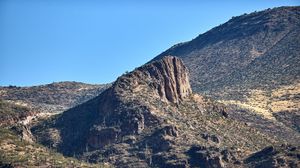 Preview wallpaper rocks, mountains, cactus, slope, sky