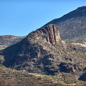 Preview wallpaper rocks, mountains, cactus, slope, sky