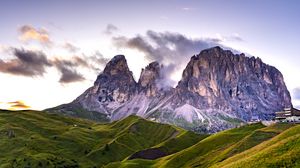 Preview wallpaper rocks, mountains, clouds, hills, grass