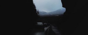 Preview wallpaper rocks, mountains, darkness, cars, night, fog