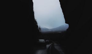 Preview wallpaper rocks, mountains, darkness, cars, night, fog