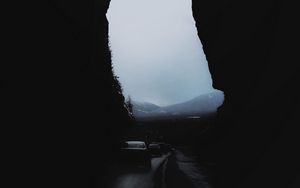 Preview wallpaper rocks, mountains, darkness, cars, night, fog