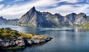 Preview wallpaper rocks, mountains, house, height, eminence, day, sea