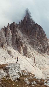 Preview wallpaper rocks, mountains, human, loneliness, peak