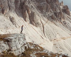 Preview wallpaper rocks, mountains, human, loneliness, peak