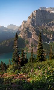 Preview wallpaper rocks, mountains, lake, spruce, trees, sky