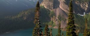 Preview wallpaper rocks, mountains, lake, spruce, trees, sky