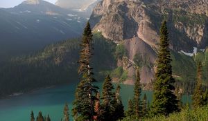 Preview wallpaper rocks, mountains, lake, spruce, trees, sky