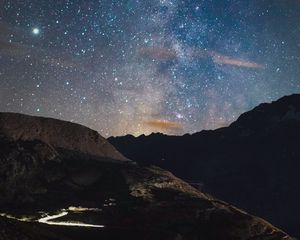 Preview wallpaper rocks, mountains, night, stars, starry sky, nebula