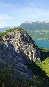 Preview wallpaper rocks, mountains, peaks, sea, branches