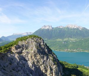 Preview wallpaper rocks, mountains, peaks, sea, branches