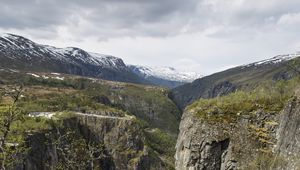 Preview wallpaper rocks, mountains, river, cliff, branches