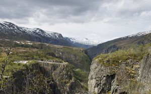 Preview wallpaper rocks, mountains, river, cliff, branches