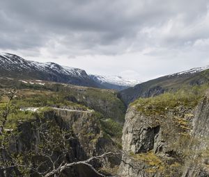 Preview wallpaper rocks, mountains, river, cliff, branches