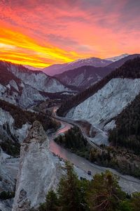 Preview wallpaper rocks, mountains, river, sunset