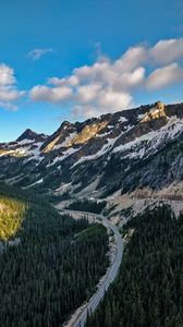 Preview wallpaper rocks, mountains, road, forest, slope