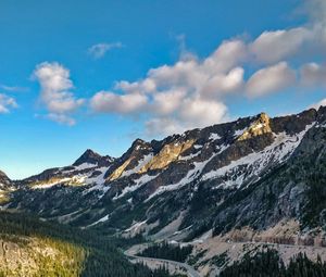 Preview wallpaper rocks, mountains, road, forest, slope