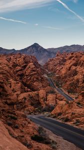 Preview wallpaper rocks, mountains, road, winding, sky