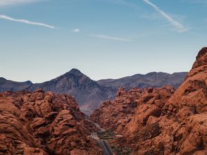 Preview wallpaper rocks, mountains, road, winding, sky