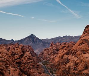 Preview wallpaper rocks, mountains, road, winding, sky